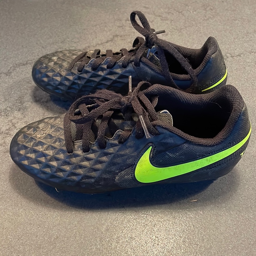 Kids Nike Tiempo black cleats, size 2.5